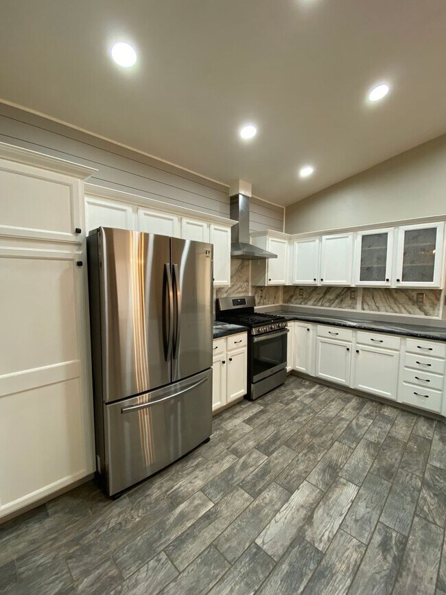 Building Photo - *COMING SOON* Beautifully Upgraded Rancher...