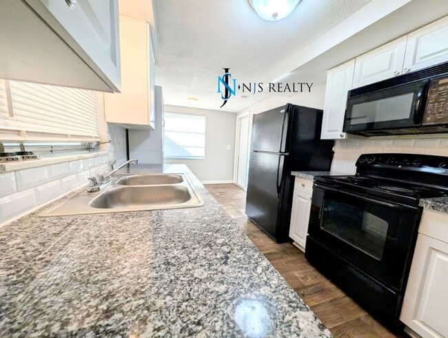 Building Photo - Check out this 3/1.5/1 1113 Sq. Ft. with UPDATED bathrooms and kitchen with GRANITE, LARGE backya...