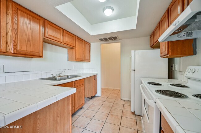 Building Photo - 4435 E Pueblo Ave