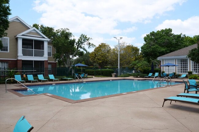 Building Photo - Upgraded Condo in Gated Community of Plant...