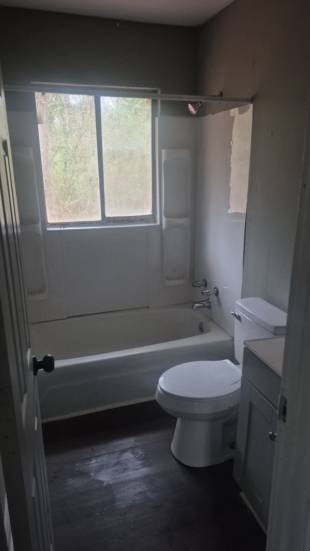 Building Photo - Cozy Home with Updated Flooring and Bright Rooms