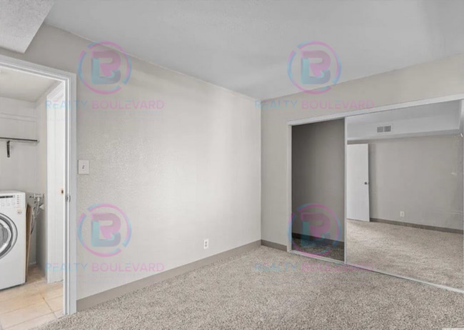 Building Photo - Incredible condo near UNR! This charming 2...