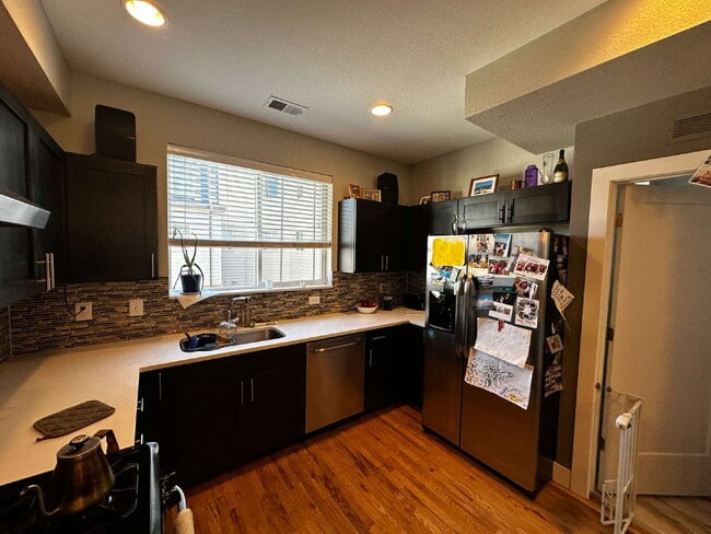Building Photo - "Experience Modern Comfort: Spacious 2-Bed...