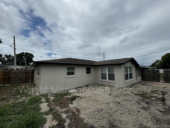 Building Photo - 7639 Jasmine Blvd