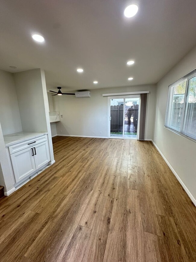 Building Photo - Remodeled 2 Story 3BR/2BA House with Vinyl plank flooring, Fenced backyard & 2 Car garage and more!
