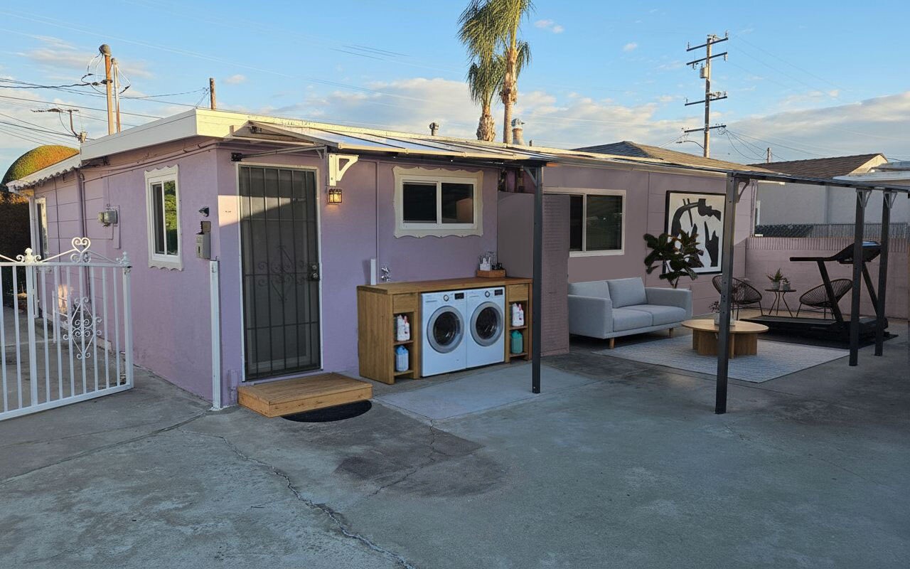 Rear shaded Patio - staged for visualization. Washer/dryer and cabinet not included with the rental - 16825 S Berendo Ave