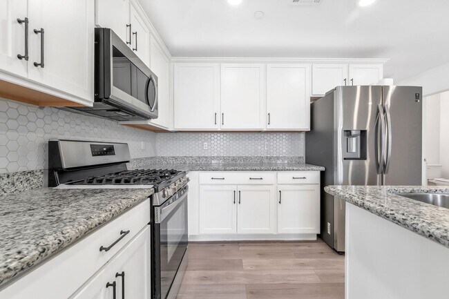 Building Photo - Modern Cadence Living with Designer Upgrades & Resort-Style Amenities!