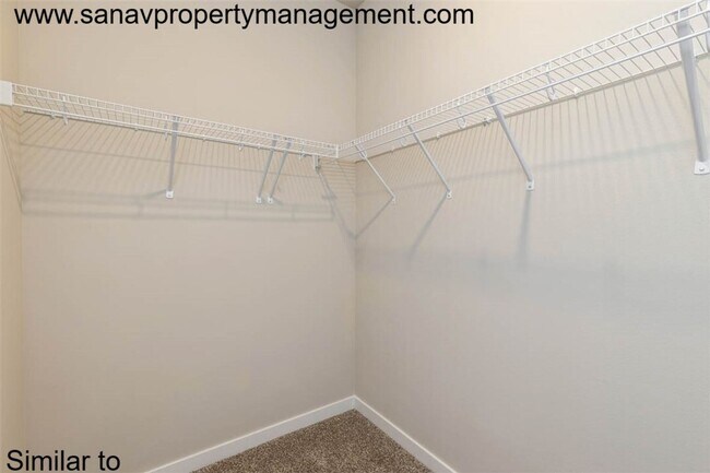 Building Photo - "Charming 2-Bedroom Home in Exclusive 36 W...