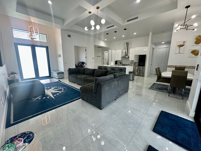 Building Photo - Fully Furnished Annual Rental- 3 Bedroom 2 Bathroom - Pool and Waterfront- NE CAPE CORAL