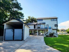 Building Photo - Riverfront Living with Private Boat Launch