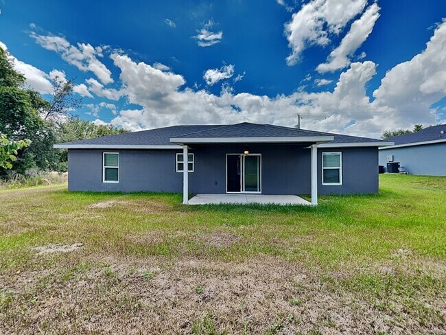 Building Photo - 7867 N Manville Rd