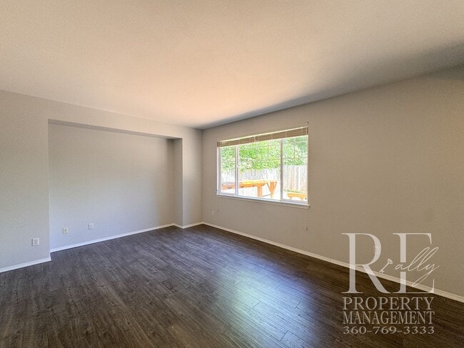 Building Photo - Dual Primary Suites, Huge Backyard Deck & Sun-Filled Living Spaces Near Everyday Conveniences
