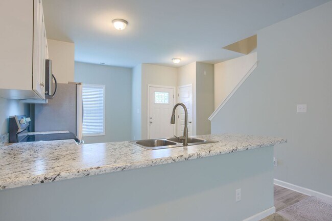 Building Photo - Charming 2-Bed, 2.5-Bath Townhome