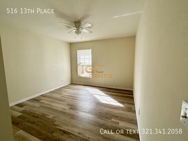 Building Photo - 516 13th Pl