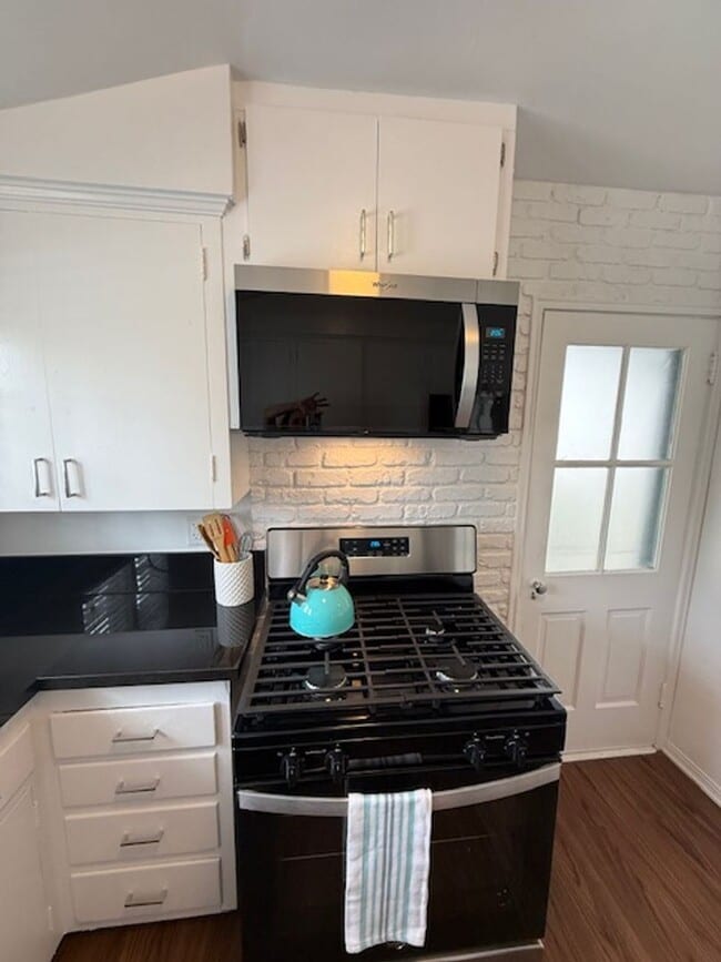 Building Photo - Bungalow - 1 bedroom + Office = natural wood floors, mini split a/c , new appliances, private pat...