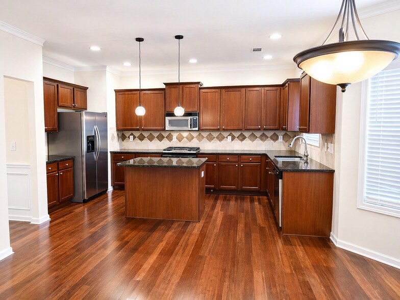 Updated kitchen with brand-new stove and modern cooking space. - 2143 Somerset Pl SE