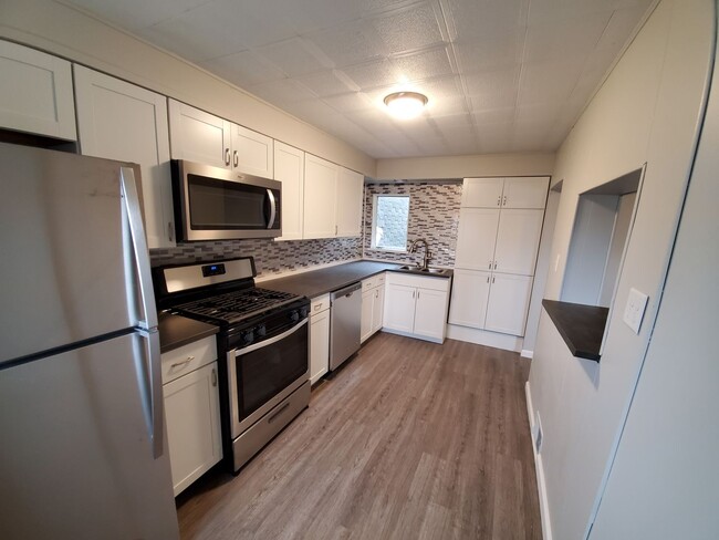 Building Photo - AVAILABLE MAY  - Newly Renovated 3 Bedroom...