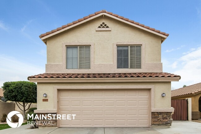 Building Photo - 7013 W Aire Libre Ave