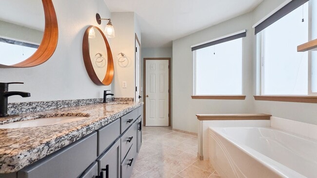 Building Photo - Updated 4-Bed Home Near Future Light Rail ...