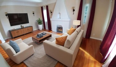 Building Photo - Gorgeous and Spacious 3-Bedroom 2-Bath home with Built-In BBQ, Garage, Hardwood Floors & Yard! MO...