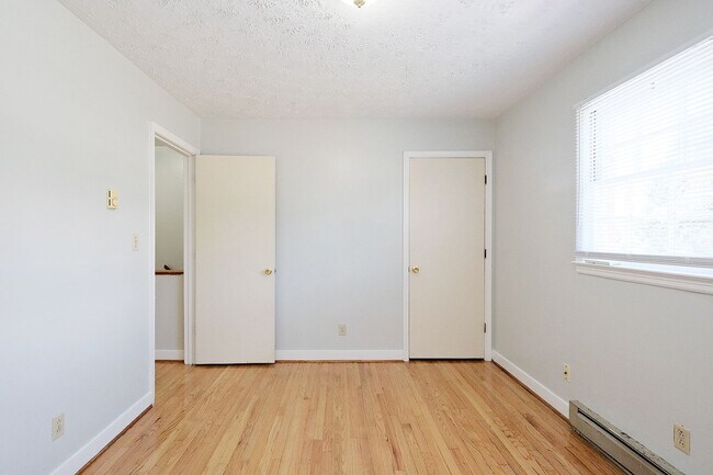Building Photo - Small Dog-Friendly Woolen Mills Duplex Near Downtown