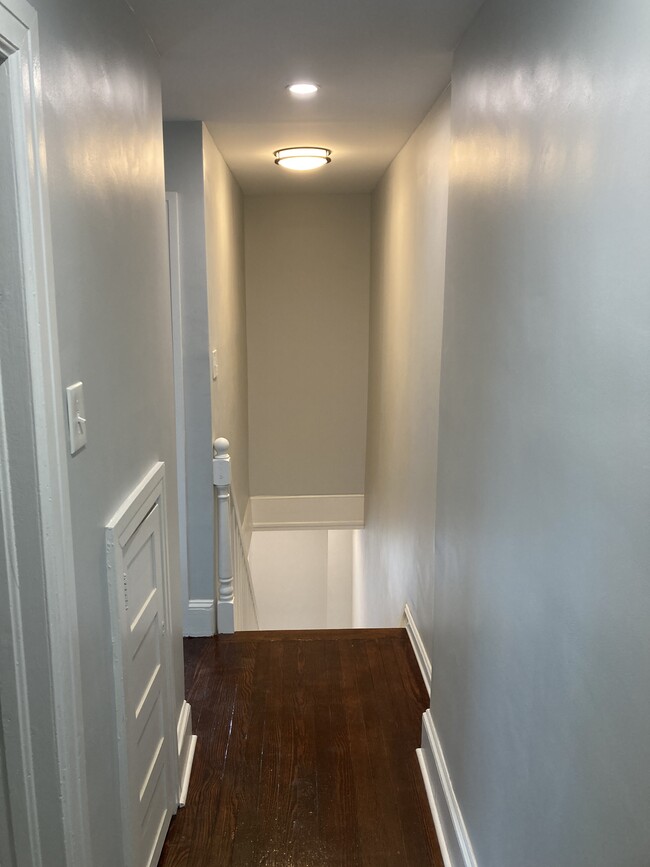 Coming up the stairs from the living room to the second floor, you'll enjoy hardwood floors througho - 2621 E Somerset St