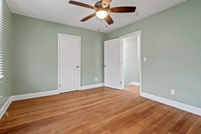Master bedroom upstairs with two walk-in closets - 4517 Tracy Ave