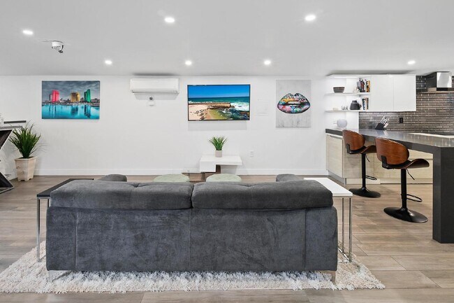 Building Photo - Live in one of San Diego’s most desirable locations in This award-winning architectural gem, "7 o...