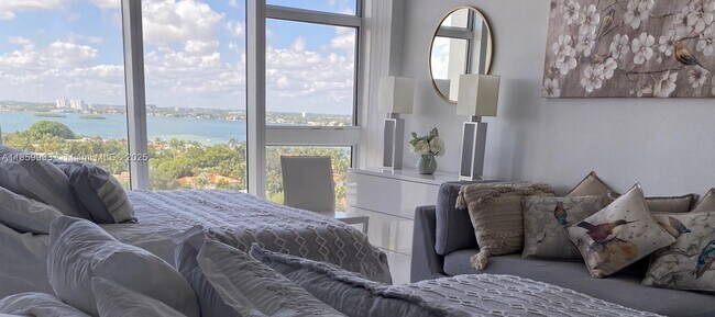 Building Photo - 10275 Collins Ave