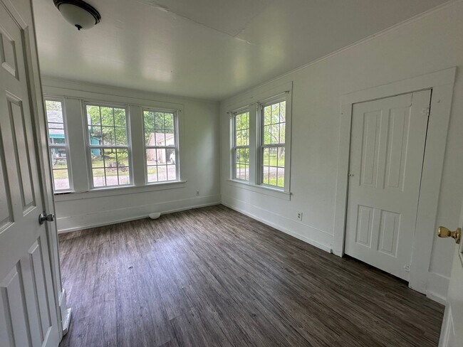 Building Photo - Welcome to this charming 3-bedroom, 2-bathroom home located in Atkins, AR