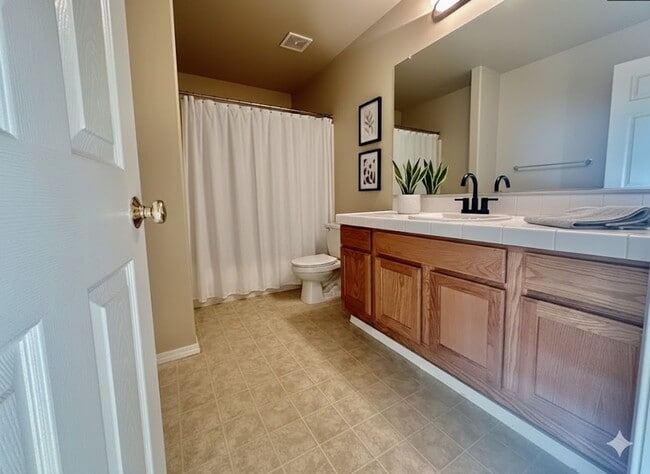 Building Photo - The Townhome That Ticks Every Box: Space, Privacy, and Location! **$500 OFF 2ND FULL MONTH'S RENT**