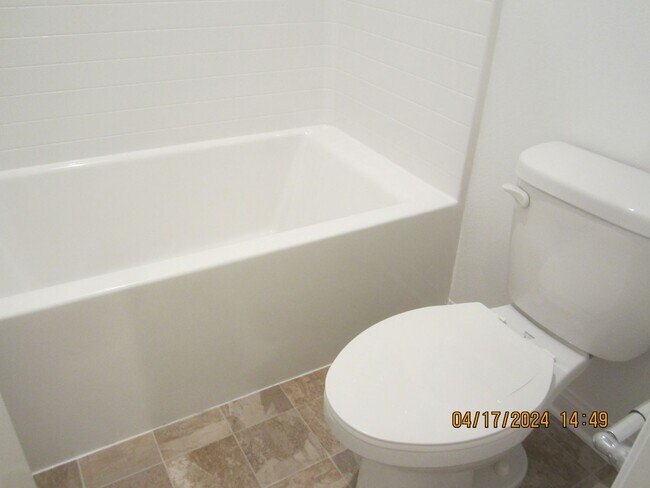 Building Photo - COOL POOL, PARKS AND NEAR NEW 3 BR PLUS DEN IN MEINFEE