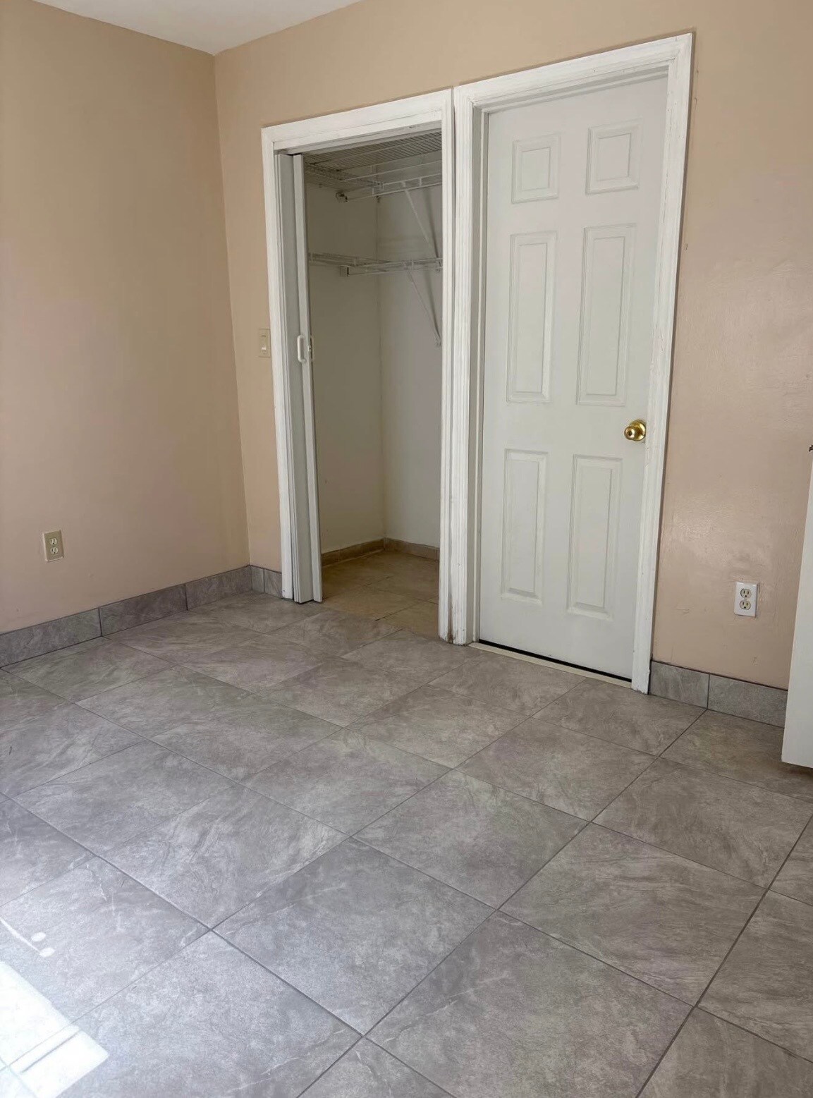 Master bedroom closet and entrance to bathrom - 209 NW 28th Ave