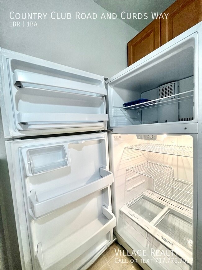 Building Photo - 671 Country Club Rd