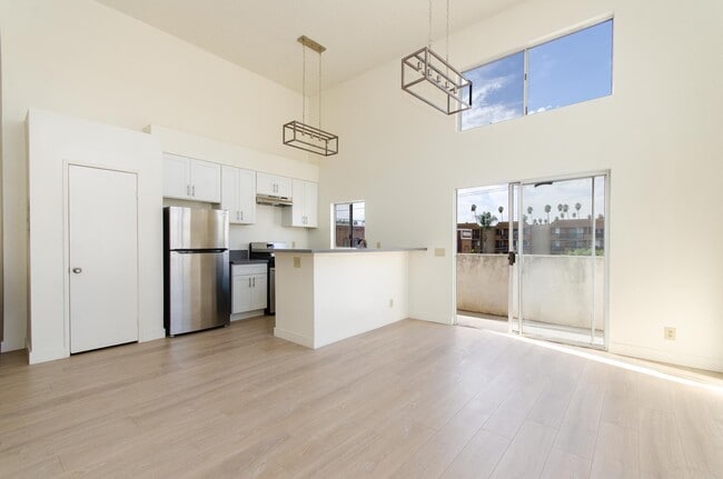 Tons of lighting and tall ceilings! - 321 S Berendo St