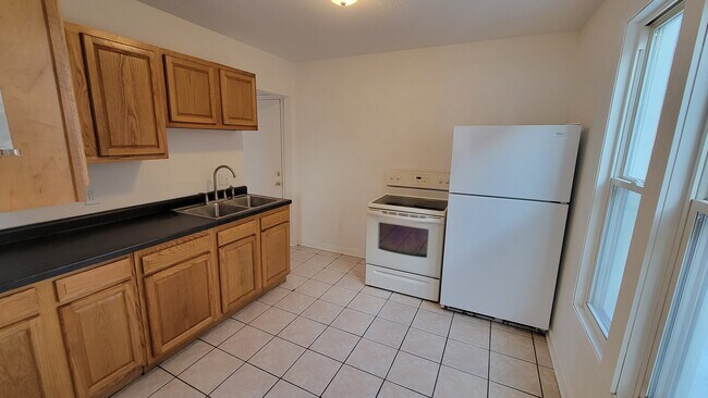 Building Photo - Chisholm Duplex