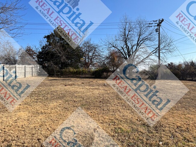 Building Photo - Spacious Harrah Home