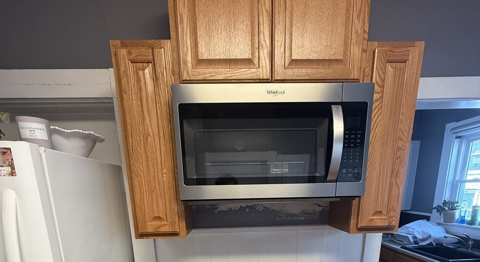 New over-range microwave plus new side cabinets installed in August 2025. - 112 Brown St
