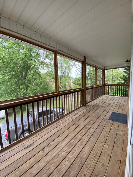 Screen porch overlooking yard - 12 Brookside Cir