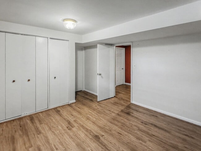 Building Photo - Furnished 4BD 2BA Home with Two kitchens, Basement, and Garage!