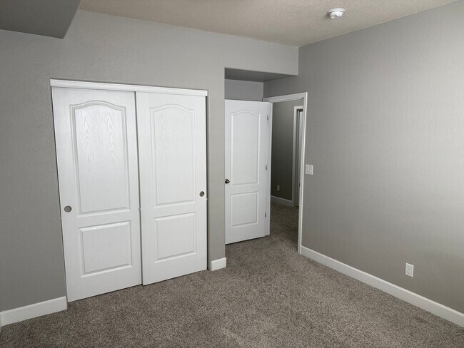 Building Photo - Greenbelt-Backed Wheatlands Home - Mountain Views, 3 Car Garage & Finished Basement