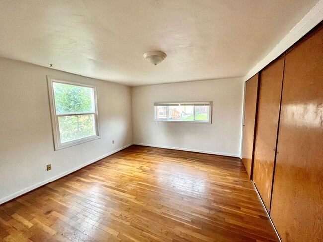 Building Photo - Cozy Single family home with two car garage and controlled access gate