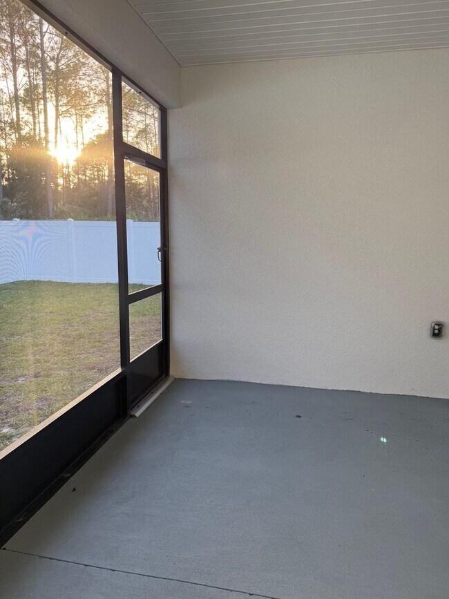 Building Photo - Brand new 3/2/2 with fenced in yard and a screened in porch!