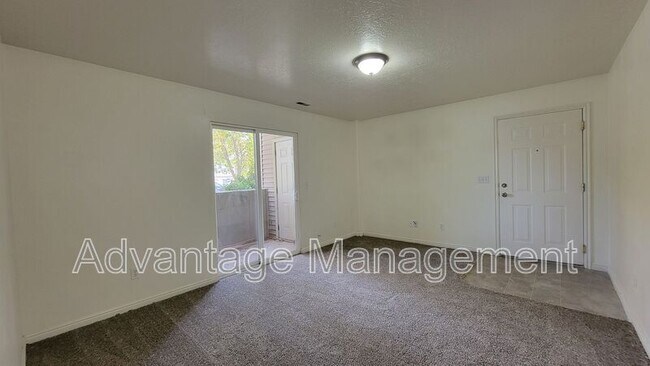 Building Photo - 8083 N Ridge Loop E