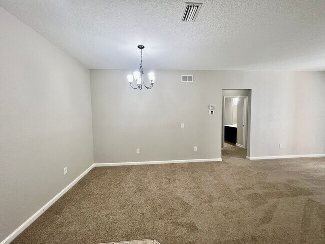 Building Photo - Stylish 3 Bedroom, 2 bath Condo with Woode...
