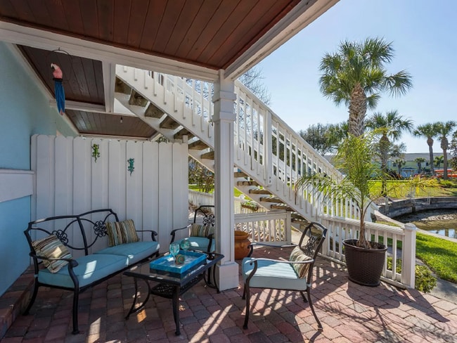 Building Photo - Stunning 2/1 available now at Waterside at Coqunia Key!