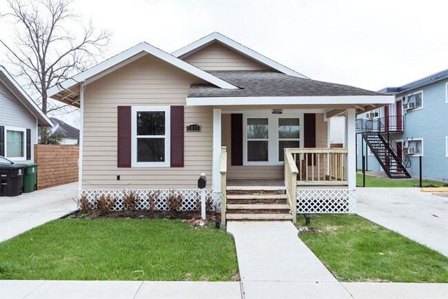 Beautiful home with a covered front porch. - 3811 Fox St