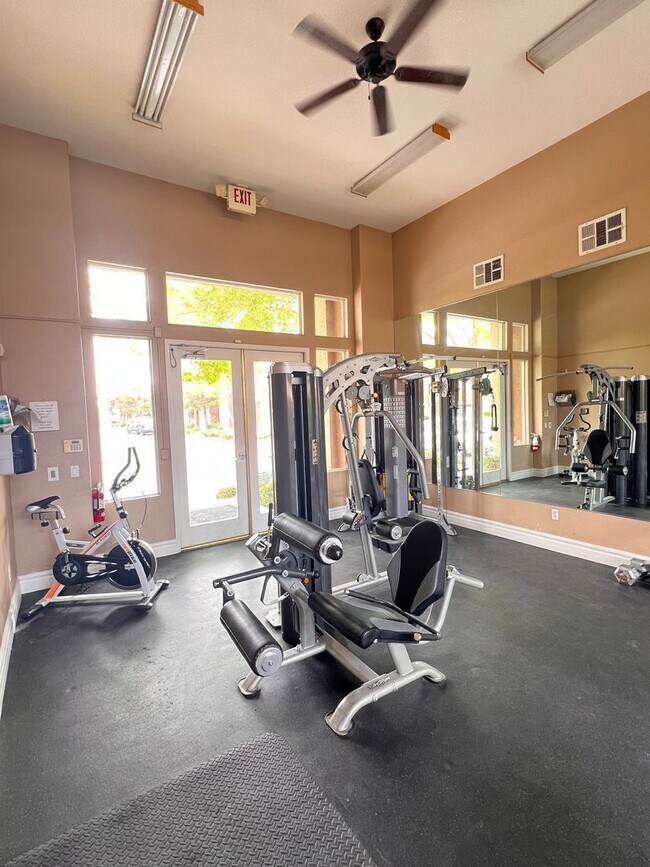 Building Photo - Gated Community / Community Pool / Luxury Vinyl Planking Throughout