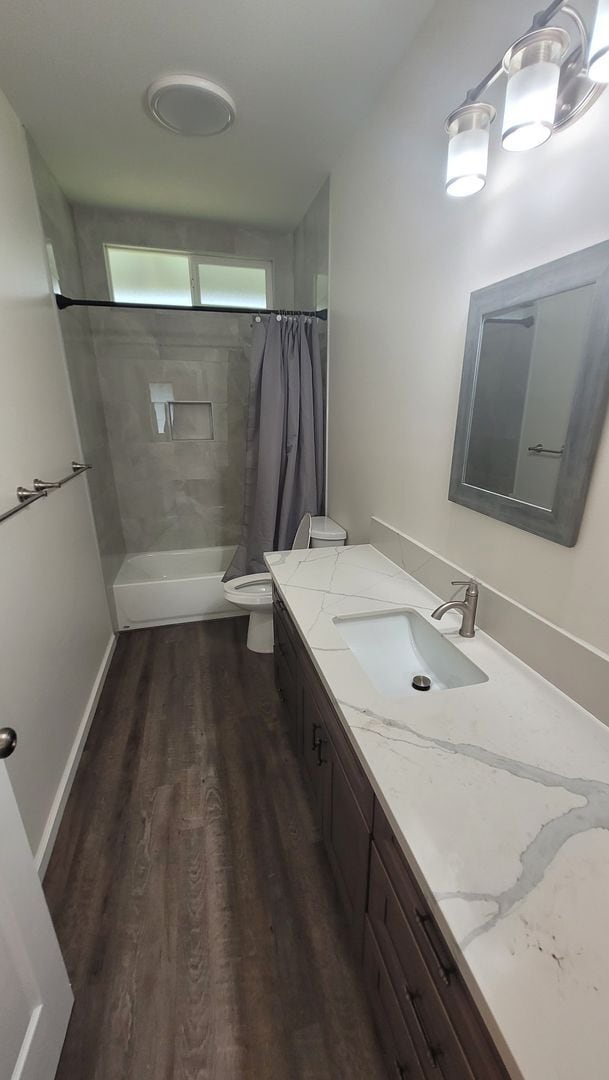 Building Photo - This 3-bedroom, 2-bath home in Orchidland Subdivision