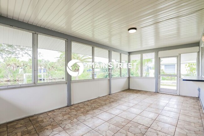 Building Photo - 3 Bedroom Pet-Friendly Home in PORT CHARLOTTE, FL with Main Street Renewal